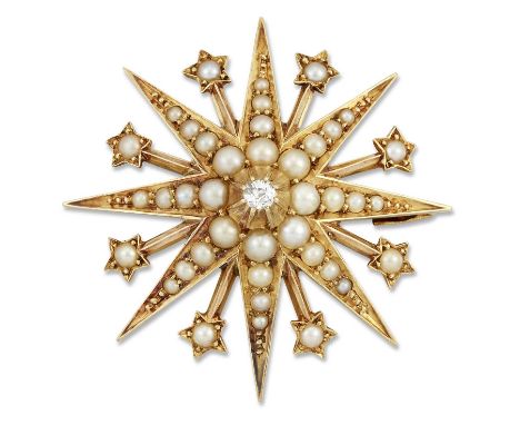 A LATE 19TH CENTURY DIAMOND AND SEED PEARL STAR BROOCH, an old-cut diamond within a seed pearl-set starburst frame. 2.9cm dia