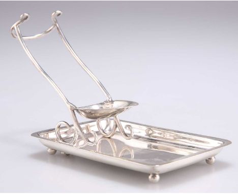 AN EDWARDIAN SILVER PIPE STAND, by John George Betjemann &amp; Ernest Edward Betjemann, London 1901, with a rectangular base.