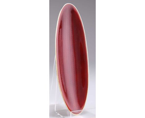 A NORWEGIAN SILVER AND ENAMEL DISH, by David Andersen, of elongated oval form, decorated with engine-turned deep red enamel, 