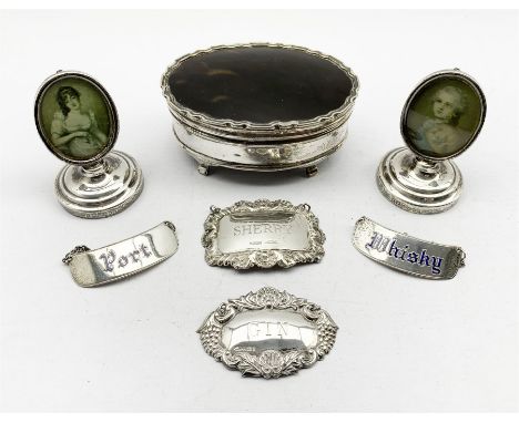 Silver oval dressing table box with hinged tortoiseshell cover on shaped supports W10cm Birmingham 1920 Maker Mappin and Webb