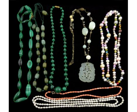 Two malachite bead necklaces, gilt carved jade pendant necklace, two pearl necklaces , coral necklace and one other (7) Click