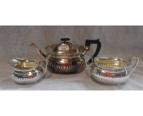 A THREE PIECE SILVER TEA SERVICE comprising,; teapot, sucrier and milk jug