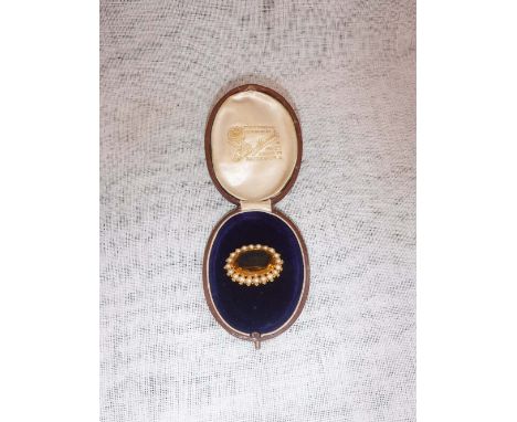 A GEM-SET AND PEARL BROOCH, in a fitted presentation case