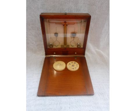 A MAHOGANY CASED TRAVELLING SCALES and a set of silver Assay weights by L Oertling, London