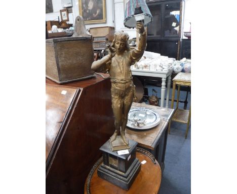 AN EDWARDIAN SPELTER TABLE LAMP, in the form of King Arthur, on a black slate plinth