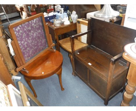 A 1930'S OAK MONK'S BENCH, an Art Deco style fire screen, a caned stool and a coffee table