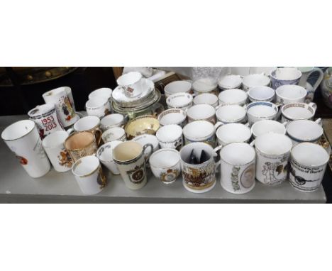 A LARGE COLLECTION OF COMMEMORATIVE CERAMIC MUGS, plates and some cups and saucers
