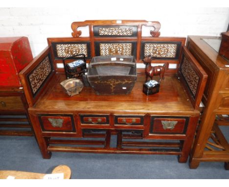 A CHINESE ELM BENCH with carved and fretwork panels, fitted drawers below, 44" wide