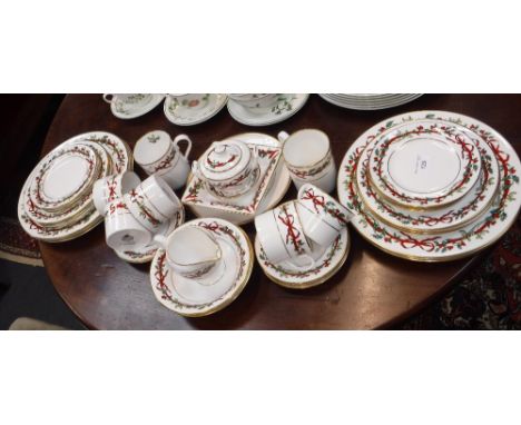A ROYAL WORCESTER 'HOLLY RIBBONS'  DINNER SERVICE