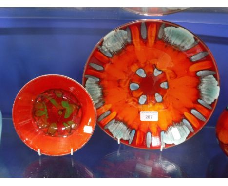 A POOLE POTTERY BOWL from 'The Volcano' range and another similar bowl