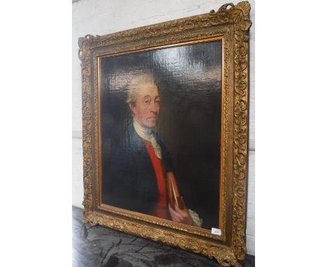 ENGLISH SCHOOL: A large portrait of a C18th gentleman holding a book, in a gilt frame, oil on canvas