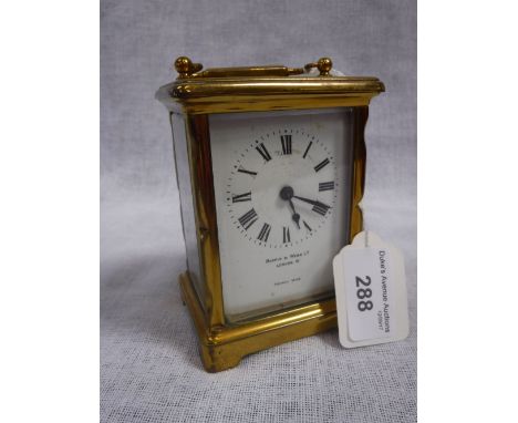 A BRASS-CASED CARRIAGE CLOCK, the white enamel dial signed 'Mappin & Webb, London'