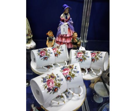 A ROYAL DOULTON FIGURE, Royal Worcester cups and saucers and other ceramics