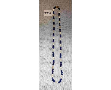 A LAPIS AND PEARL NECKLACE