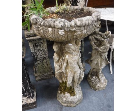 A RECONSTITUTED STONE GARDEN PLANTER, in the form of 'The Three Graces' 32" high