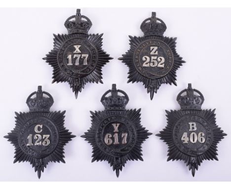 Five Metropolitan Police Kings Crown Numbered  Helmet Plates, 1910-20’s KC black stars, with white metal Divisional letter an