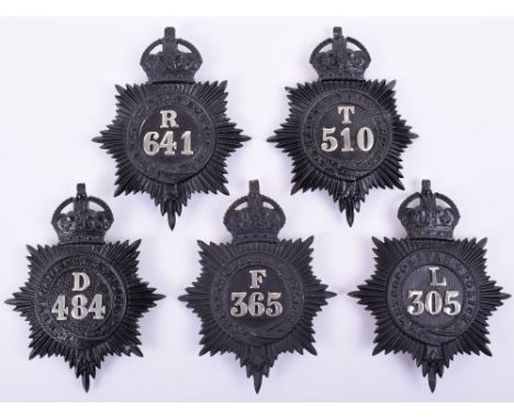 Five Metropolitan Police Kings Crown Numbered  Helmet Plates, 1910-20’s KC black stars, with white metal Divisional letter an
