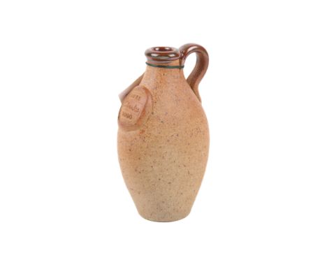 A John Leach limited edition pottery flagon for Clarks 2000. Muchelney Pottery, Somerset, No. 106. With original label. H16cm