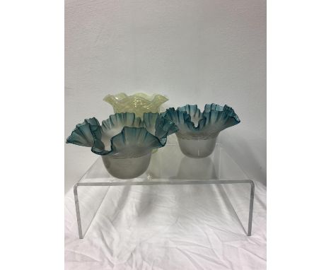 Architectural Salvage - A pair of flower form trailed glass lampshades, the frilled crimped edge tinted in blue, 17.5cm max; 