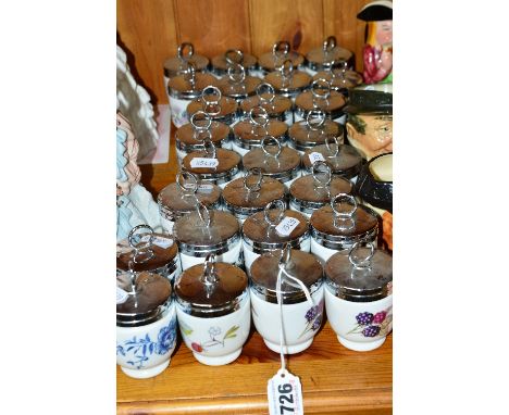 TWENTY EIGHT ROYAL WORCESTER EGG CODDLERS, to include a variety of patterns, all with lids and in good condition