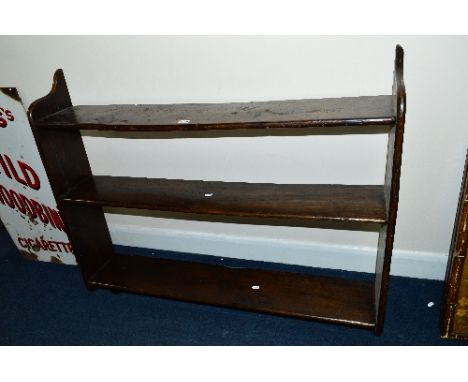 A GEORGIAN OAK AND ELM THREE TIER HANGING WALL SHELF