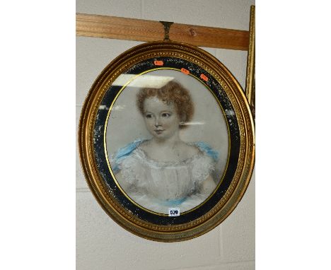 19TH CENTURY SCHOOL, half length portrait of a young girl, wearing white dress with blue ribbons, chalks and watercolours, ov