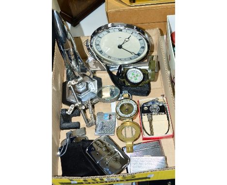 A SMALL TRAY OF COLLECTABLES, to include a Planet rocket shaped table lighter, Stanley brass compass, another green plastic c