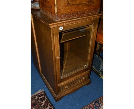 AN ERCOL ASH GLASS FRONT HI-FI CABINET, above a single drawer