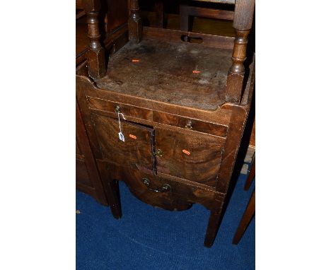 A GEORGIAN WALNUT TRAY TOP COMMODE, with double cupboard doors, pull out section with ceramic bowl (sd)