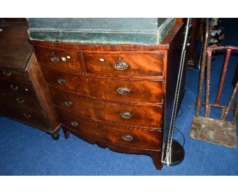 A GEORGIAN FLAME MAHOGANY BOW FRONT CHEST, of two short and three long drawers on bracket feet, approximate size width 106cm 