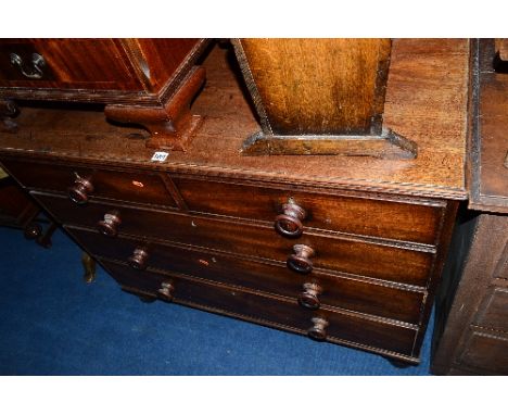 A GEORGIAN MAHOGANY CHEST, of two short and three long graduating drawers with turned handles on replaced bobbin feet, approx