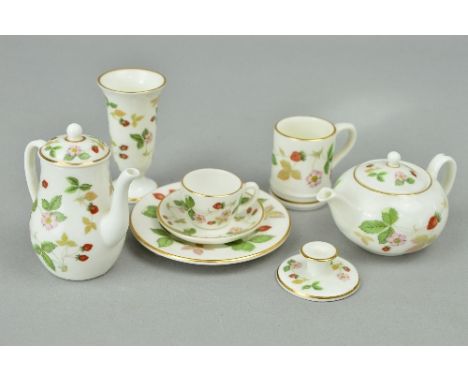 A SMALL GROUP OF WEDGWOOD MINIATURES, 'Wild Strawberry' pattern, to include coffee pot, teapot, teacup and saucer, mug, plate