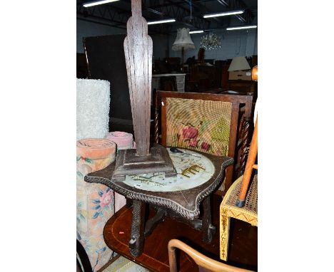 AN OAK OCCASIONAL TABLE WITH NEEDLEWORK TOP, oak firescreen and an oak standard lamp (3)