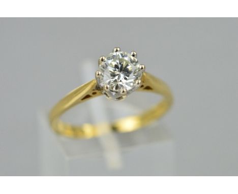 A MODERN 18CT GOLD MODERN SINGLE STONE DIAMOND RING, a modern round brilliant cut diamond measuring approximately 6.35mm x 4m