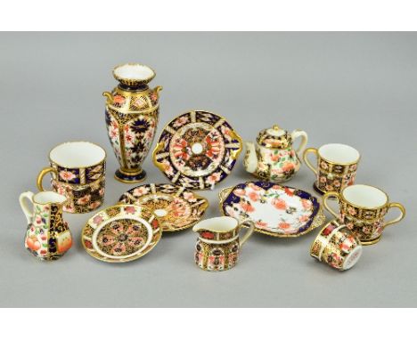 A GROUP OF ROYAL CROWN DERBY MINIATURES, to include '1128' pattern teacup/saucer, milk jug and a vase (hairline), '2451' patt