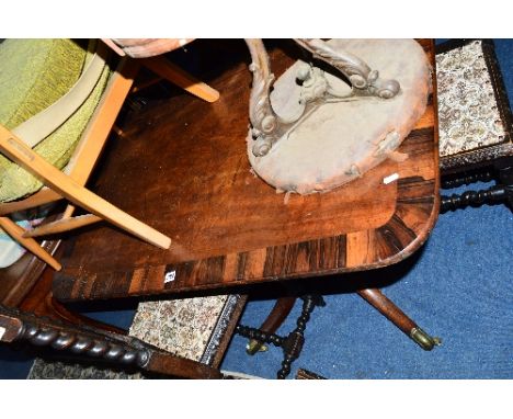 A GEORGIAN MAHOGANY AND ROSEWOOD BANDED RECTANGULAR TILT TOP TRIPOD TABLE, on brass caps and casters, approximate size width 