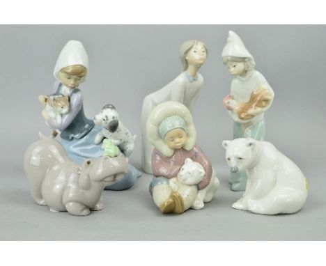 SIX LLADRO/NAO FIGURES to include 'Little Friskies' No 5032, a Lladro inuit playing with polar bear cub No 1195, a polar bear