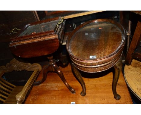 AN EDWARDIAN MAHOGANY OVAL TOPPED OCCASIONAL TABLE, with a separate glass tray, together with a square drop leaf tripod table