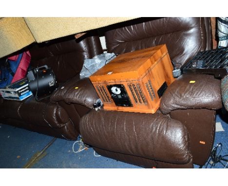 A BROWN LEATHER ELECTRIC RECLINING TWO PIECE LOUNGE SUITE, comprising of a 3 seater sofa and a armchair