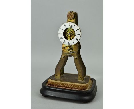 A LATE 19TH CENTURY FRENCH BRASS SKELETON TYPE CLOCK, white enamel chapter ring with Roman numerals named R. HOLT ET CIE A PA