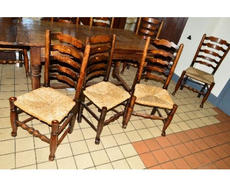A NEAR SET OF EIGHT LATE 19TH CENTURY OAK LADDER BACK RUSH SEATED CHAIRS 