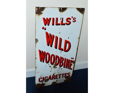 A VINTAGE ENAMEL SIGN, reading Will's Wild Woodbine cigarettes