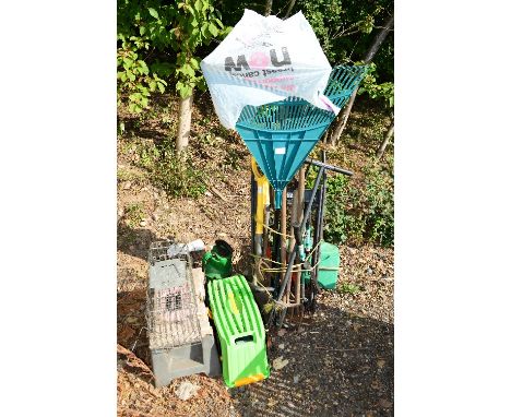 A BUNDLE OF GARDENING TOOLS, a Hoselock hose reel, a garden sprayer, a Black & Decker sack truck, two step boxes and a humane