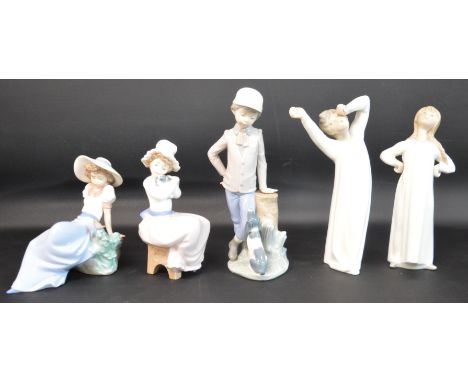 Two Lladro figurines - boy &amp; girl in nightgown (boy has repaired arm) &amp; 3 Nao figurines - girl with bird, girl with d
