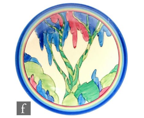 Clarice Cliff - Rudyard - A circular dish form plate circa 1933, hand painted with a stylised tree landscape in tonal blue, p