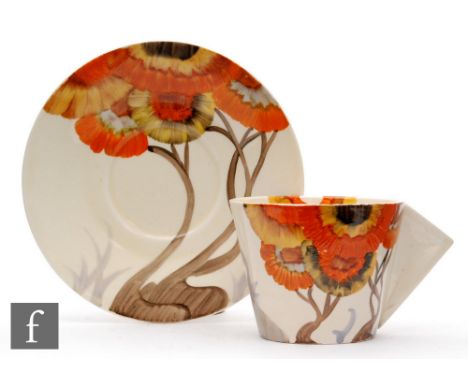 Clarice Cliff - Rhodanthe - A Conical shape coffee cup and saucer circa 1934, hand painted to cup and saucer with a stylised 