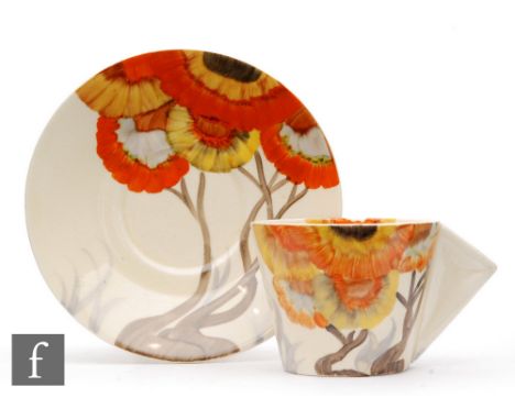 Clarice Cliff - Rhodanthe - A Conical shape coffee cup and saucer circa 1934, hand painted to cup and saucer with a stylised 