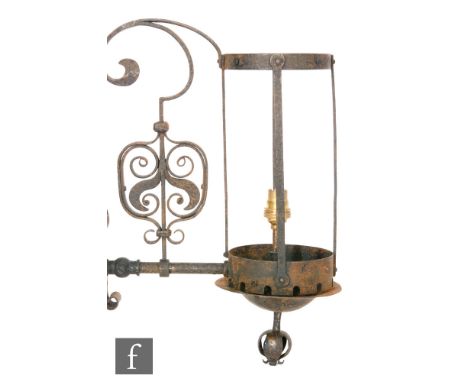 Unknown ? An Arts and Crafts wrought iron wall light with stylised floral scroll decoration, length of back plate 34cm. 