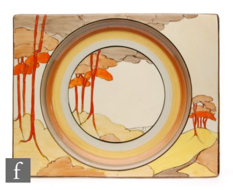 Clarice Cliff - Coral Firs - A large Biarritz plate circa 1934, hand painted to the whole with a stylised tree lined coastal 