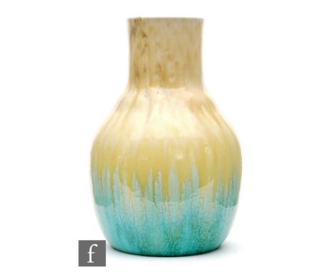 Ruskin Pottery - A crystalline glaze vase of globe and shaft form decorated in a streaked yellow to pale blue glaze, impresse